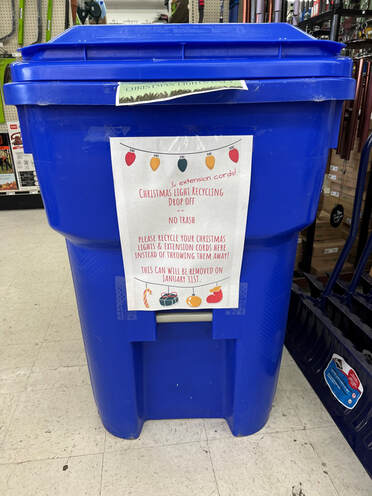 A recycling bin for unuseable christmas lights and extension cords