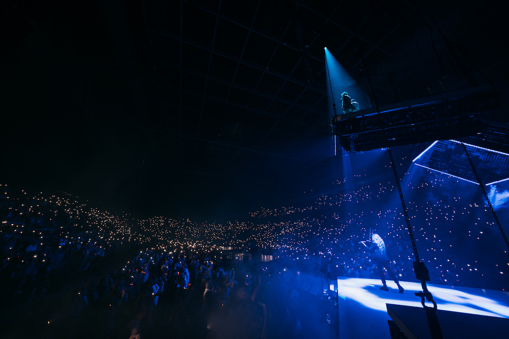 For King + Country on stage performing