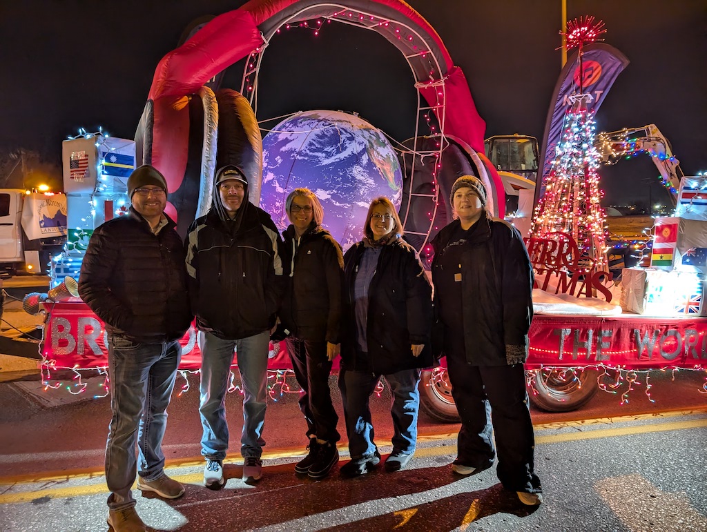 The KSLT crew and parade float